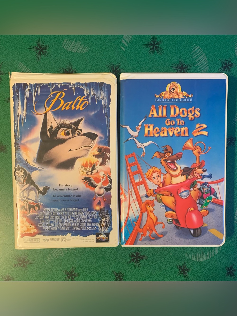 Lot of 2 1990s Animated VHS Tape Clamshell Films Balto All Dogs Go To Heaven 2